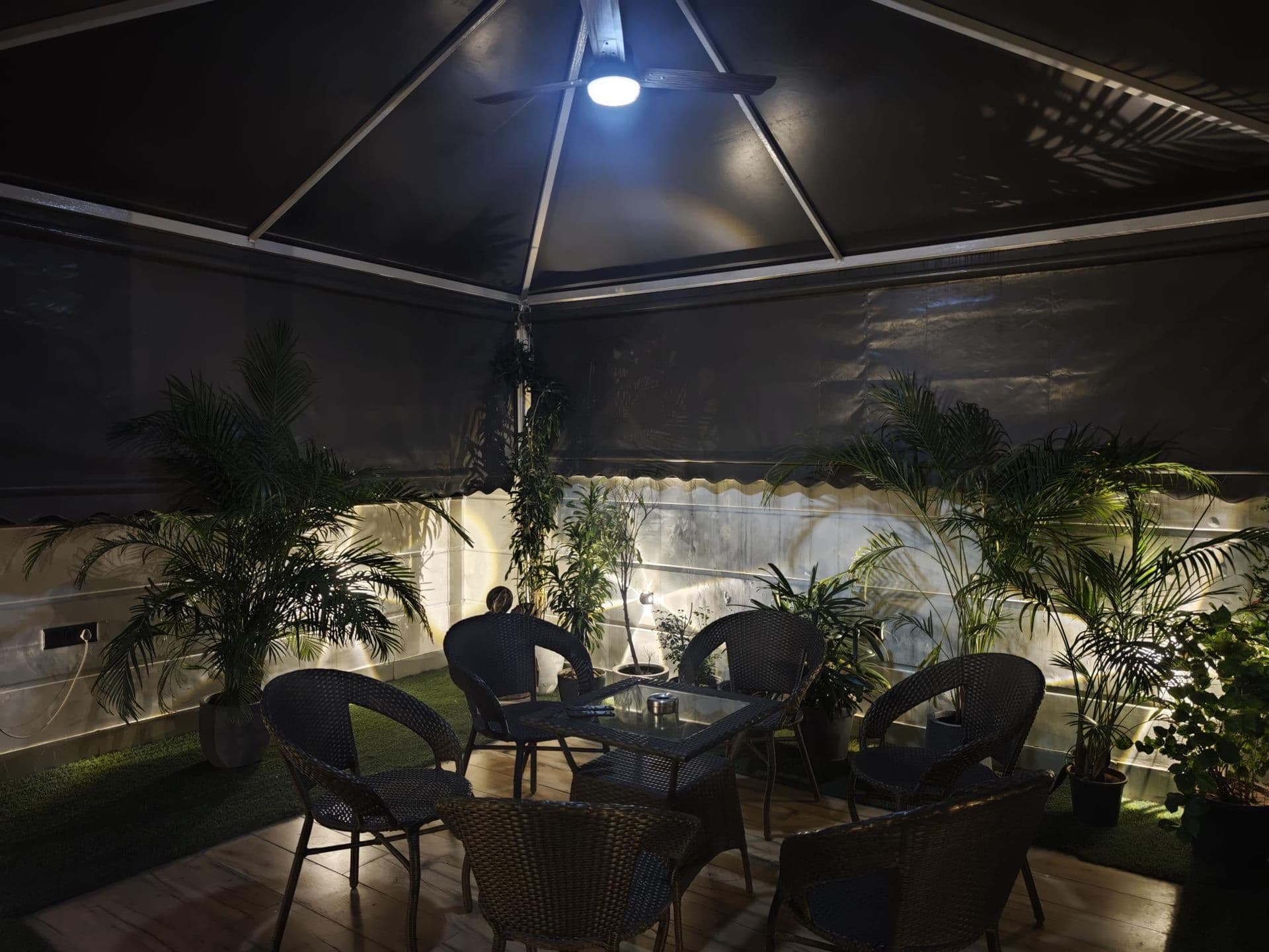 Book launches and readings at Terraza de Fiesta GK2: Lounge seating under the canopy, on green turf